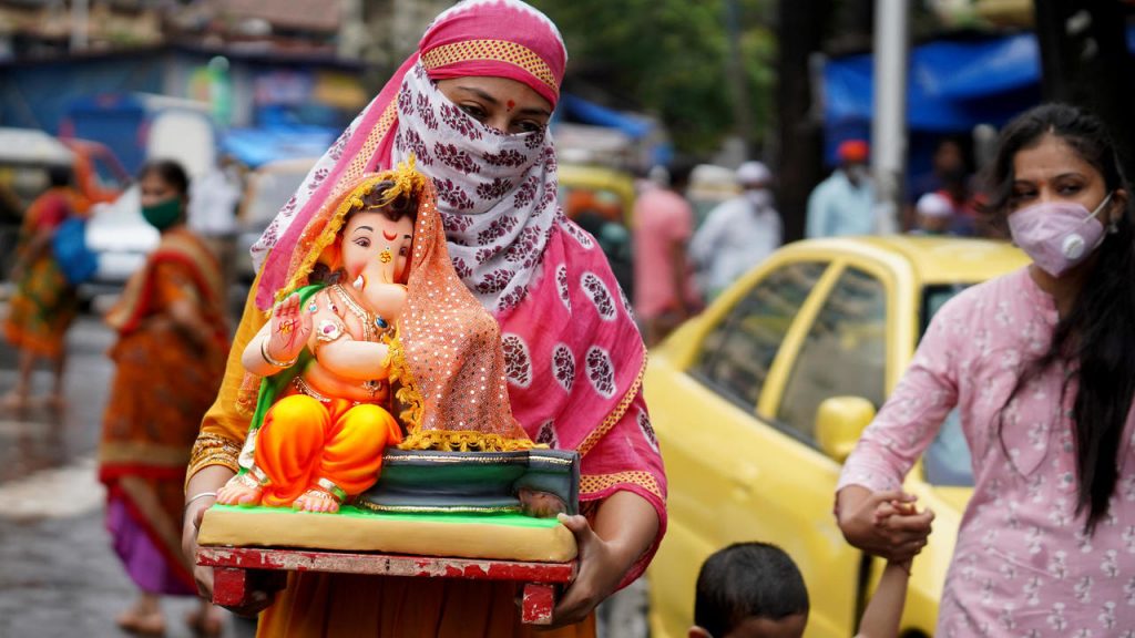 This image has an empty alt attribute; its file name is w1280-p16x9-india-covid-1024x576.jpg