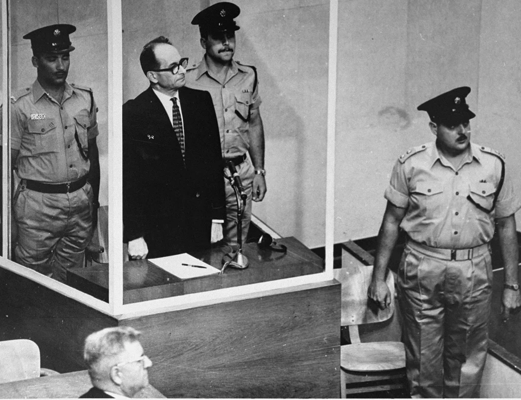 This image has an empty alt attribute; its file name is Adolf-Eichmann-court-counts-Jerusalem-war-crimes-1961-1024x786.webp